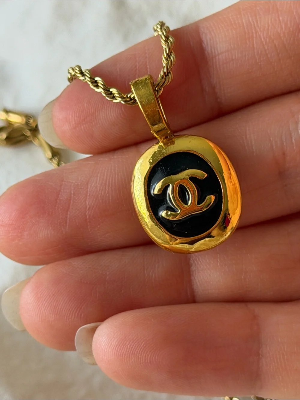 CHANEL Gold and Black Oval CC Pendant Necklace on Rope Chain
